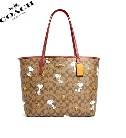 Coach X Peanuts City Tote In Signature Canvas With Snoopy Woodstock Print